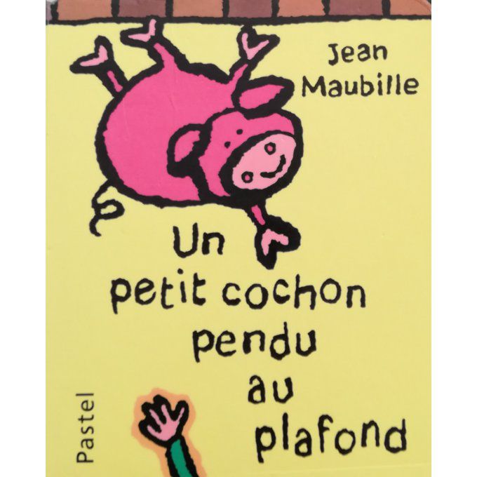 Un petit cochon pendu au plafond